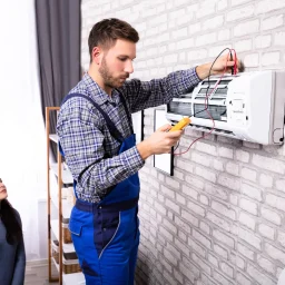 woman-observing-AC-installation