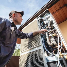 hvac-technician-servicing-home-heating